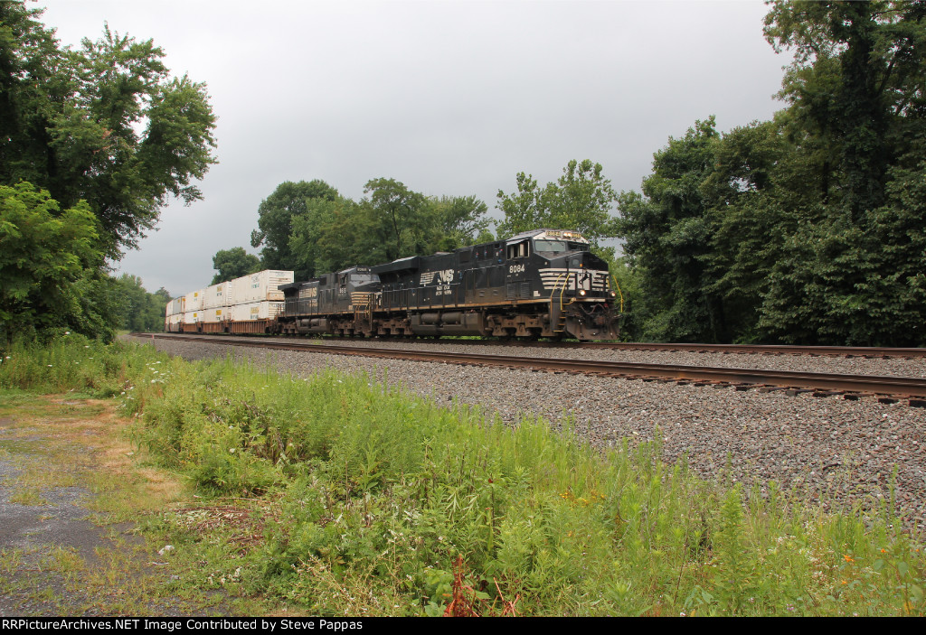 NS 8084 and 9615 with an eastbound stack train